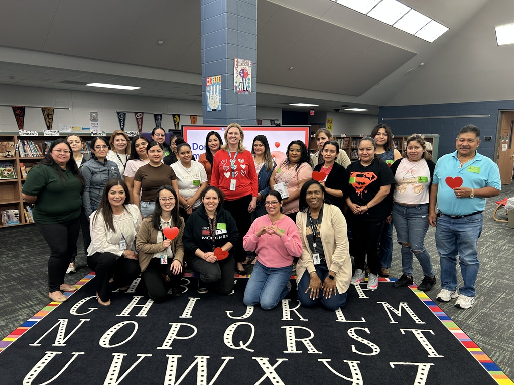 Group of people with heart signs.