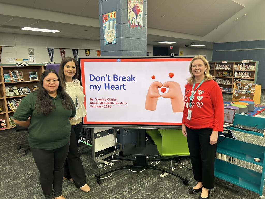 Women in front of panel 