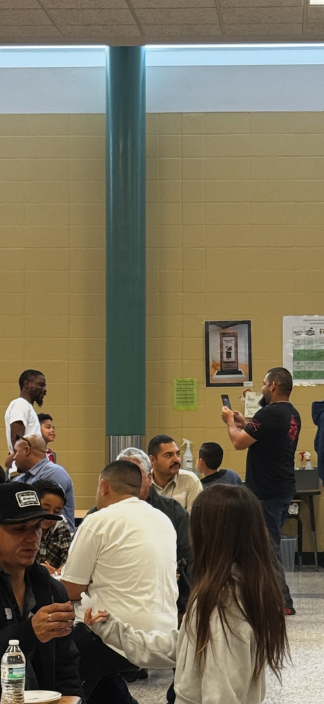 group of people in a cafeteria 