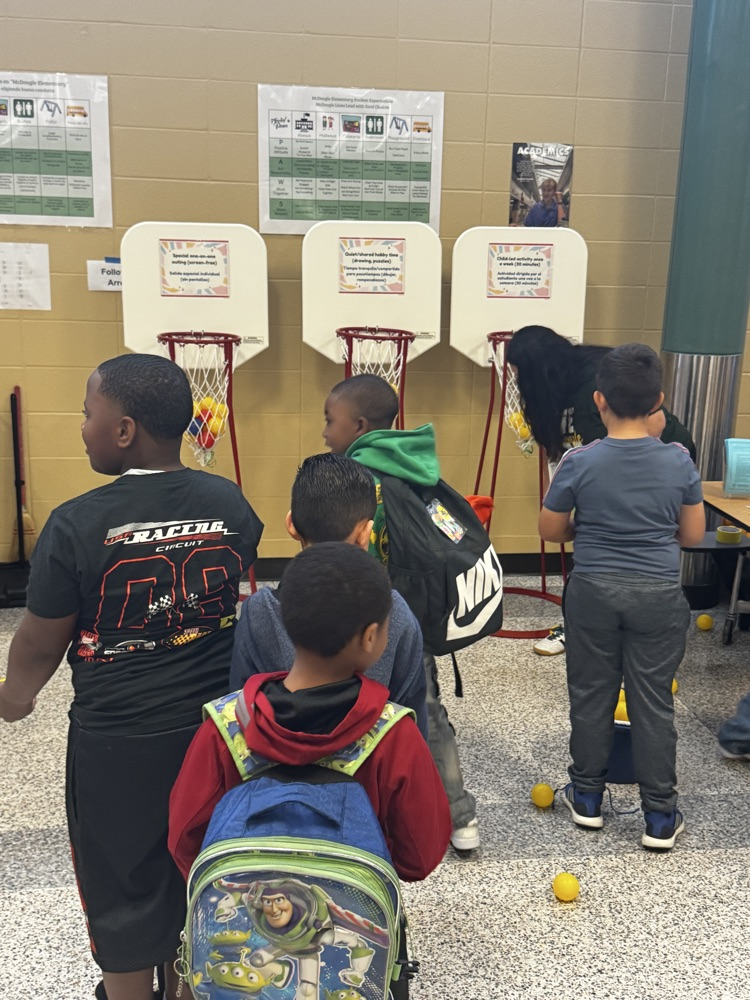 group of people in a cafeteria 