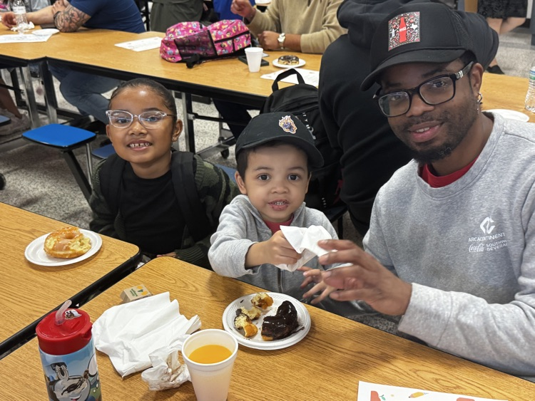 family eating donuts 
