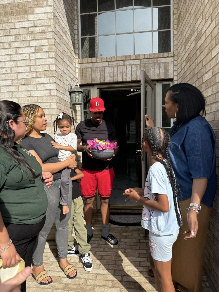 A group of people talking. 