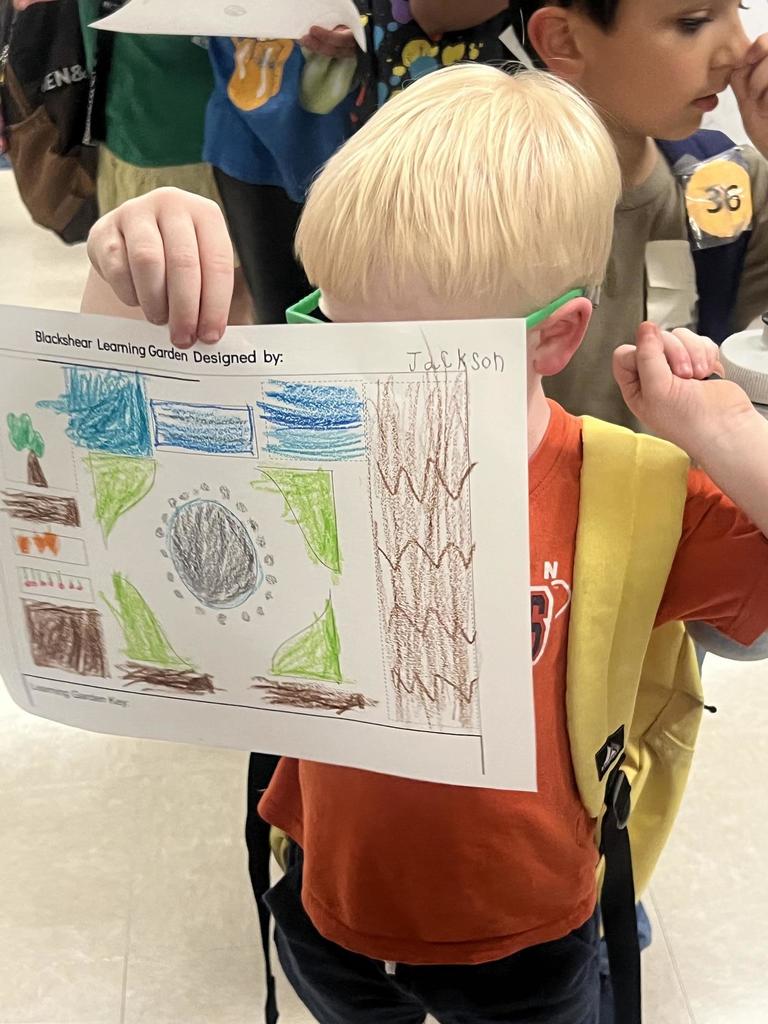 Student Showing Drawing