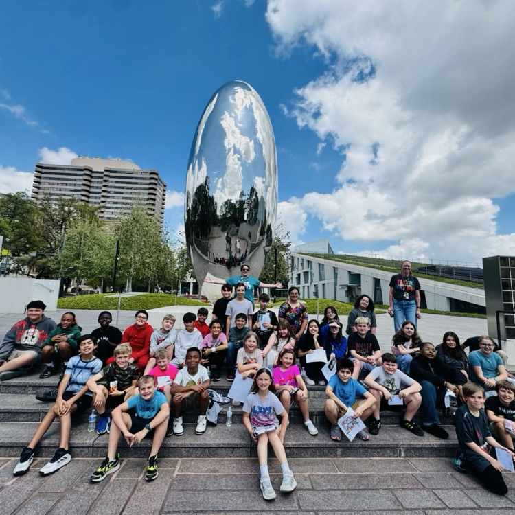 photo of students in front of museum
