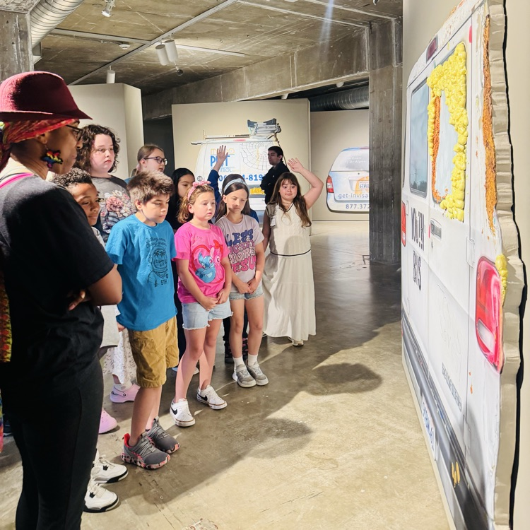 students looking at art