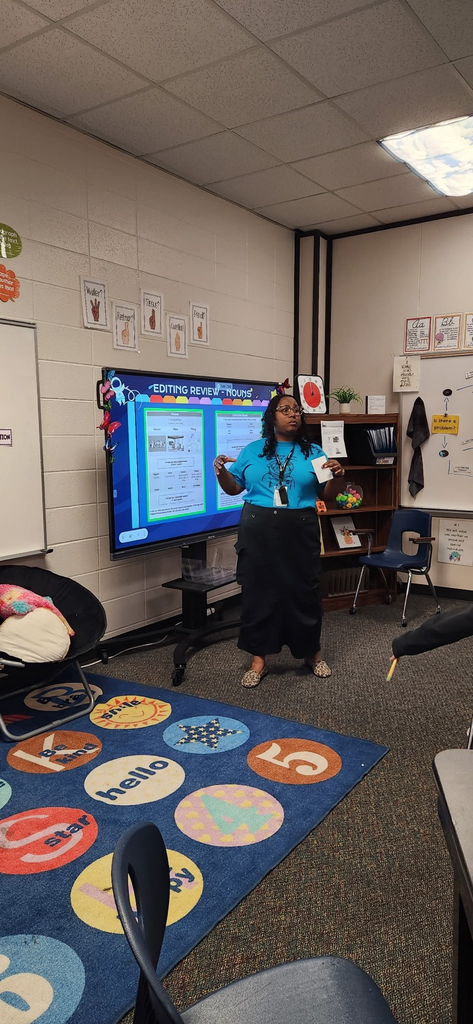 photo of students working together 