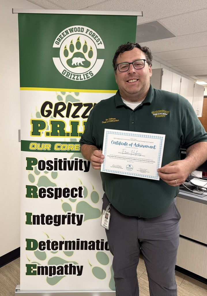 Mr. Holmes with his certificate