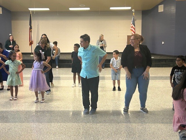 Group of people dancing.