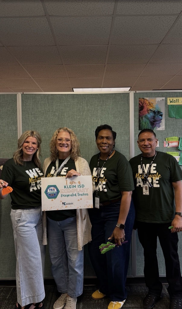 Group of educators celebrating a teacher’s success