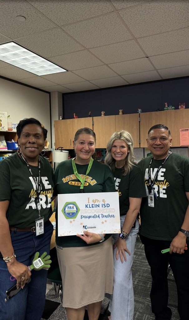 Group of educators celebrating a teacher’s success