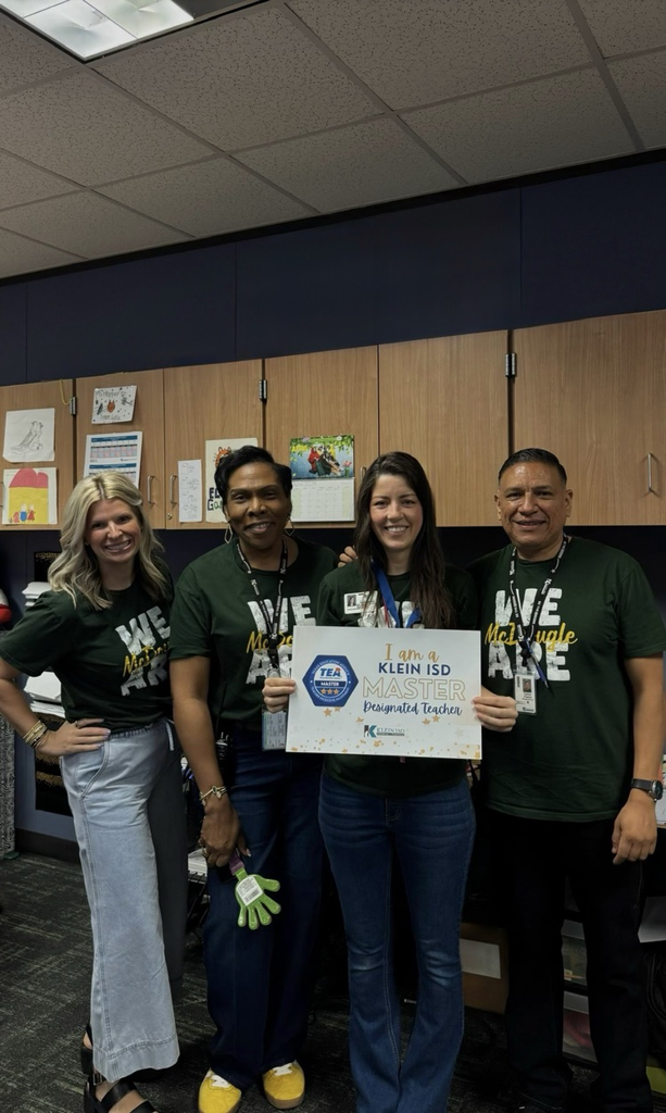 Group of educators celebrating a teacher’s achievement. 