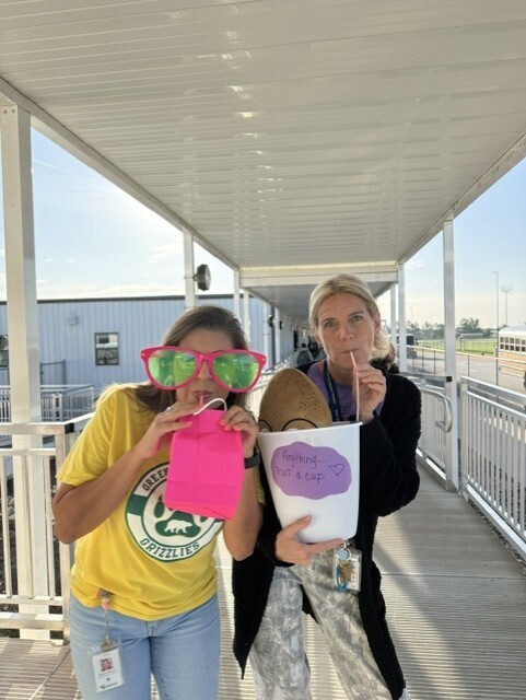 Pictures of teachers drinking out of anything but a cup