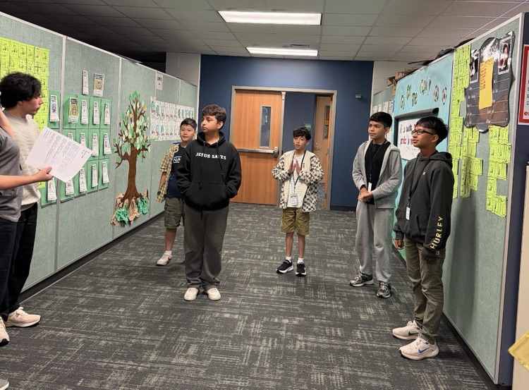 Group of students receiving medals.  