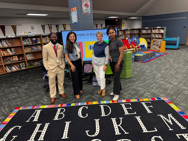 Educators presenting to 5th graders. 