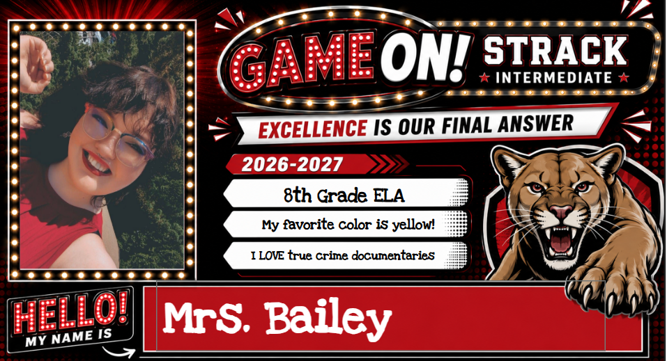 A bulletin board displays a photo of a smiling person in a red shirt. The board says "Game On! Strack Intermediate" and "2026-2027".