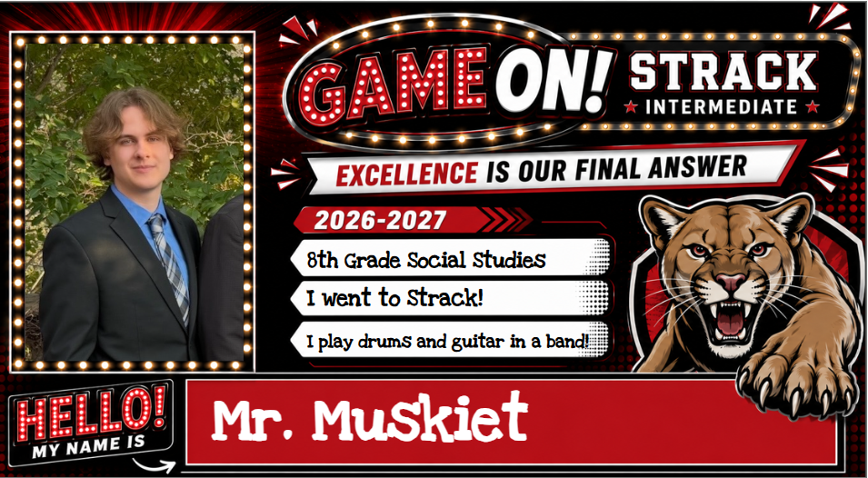 A teacher stands with a cat on a poster, reading "Game On! Strack Intermediate" and "Excellence is our final answer".