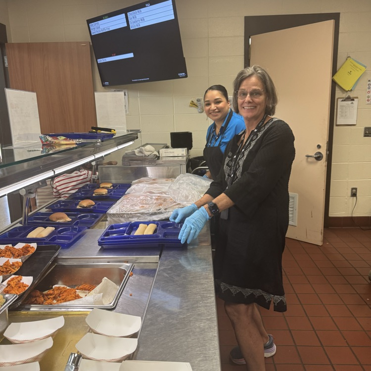 Admin serving burgers 