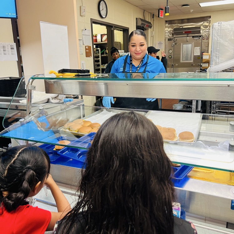 Admin serving burgers 