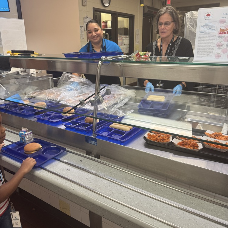 Admin serving burgers 