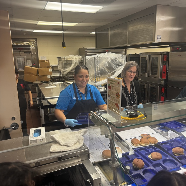 Admin serving burgers 