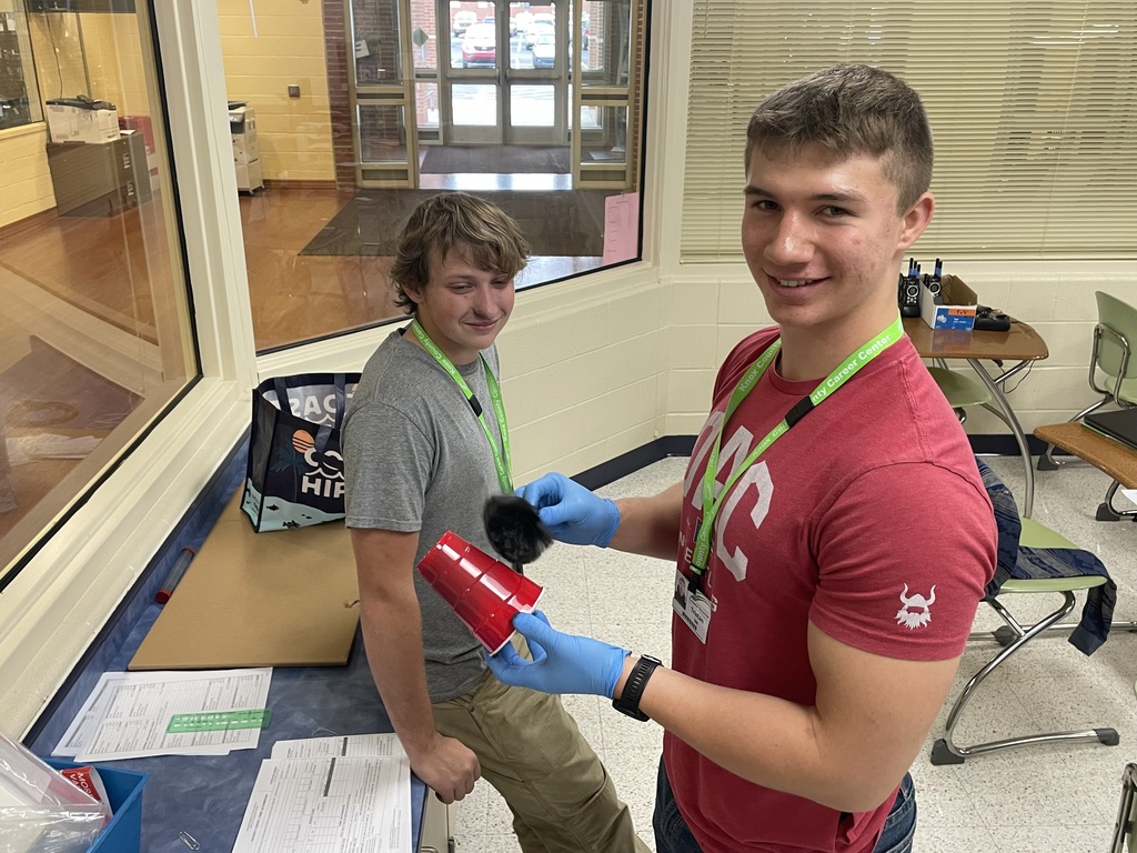 Students in Criminal Justice working on dusting for fingerprints.