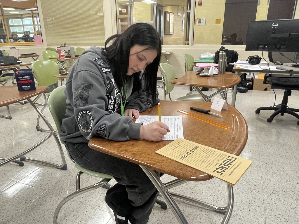 Student in Criminal Justice working on evidence collecting.