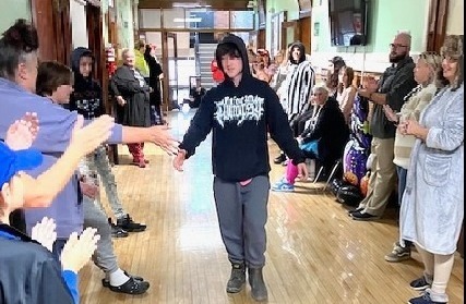 Cheers and applause greeted Gabriel Foote Friday morning as staff and fellow students at the Knox Learning Center celebrated Gabriel’s attainment of his high school diploma
