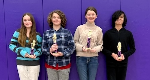 East Knox Junior High spelling bee winners include, from left, Audrey Williams, seventh-grade runner-up; Jace Daugherty, seventh-grade champion; Callie May, eighth-grade champion, and Aidyn Phom, eighth-grade runner up