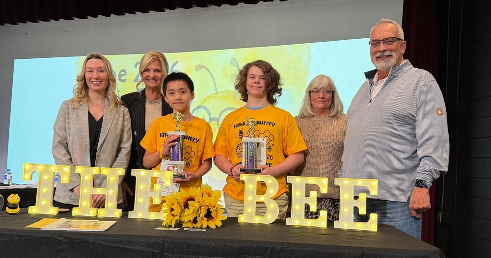 On stage at the conclusion of the 2026 Knox County Spelling Bee were, from left, Taylor Gingery, Knox ESC consultant; Commissioner Drenda Keesee; winner Vincent Jiang; runner-up Jace Daugherty; Knox Pages staff reporter Cheryl Splain, and Commissioner Barry Lester.