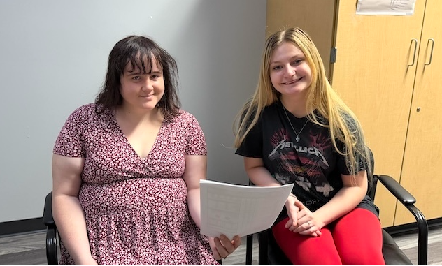 Senior Ariel Atkinson, right, shares a moment with East Knox guidance counselor Julia Kelly