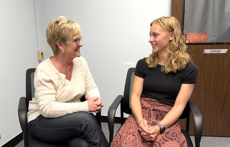 Lucy Rush shares a moment with guidance counselor Jacquelin Wihl at Mount Vernon High School