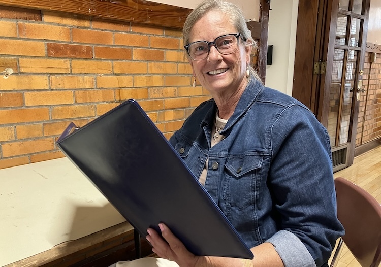 Jan Jones looks over lesson plans for the day