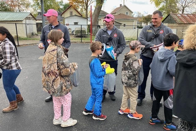 Members of the Mount Vernon Fire Department distributed treats during the Knox Learning Center’s trick or treat on Friday