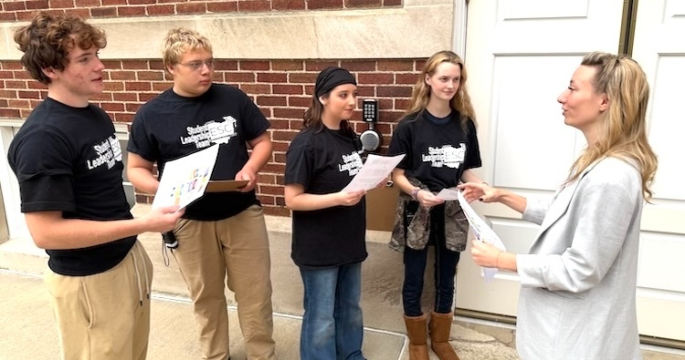 Taylor Gingery, the Knox ESC’s gifted/enrichment coordinator, talks with the volunteer Student Leadership Team from the Knox Learning Center before the Oct. 14 Youth Enrichment Series program at Knox Memorial Theater. From left are Noah, Leo, Tian and Jaden. 