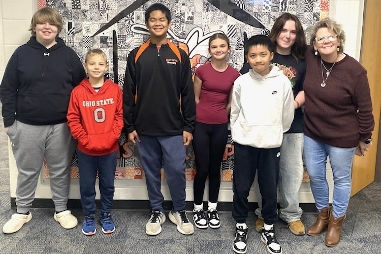 Winners and runners-up in the recent Mount Vernon Middle School spelling bee include, from left, Aiden Gilmore, sixth-grade runner-up; Edward Ernest, sixth-grade champion; Gab Cabarcas, seventh-grade champion; Maria Scarazza, seventh-grade runner-up; Vincent Jiang, eighth grade champion, and Asher Reed, eighth-grade runner-up. At right is Teresa Strong, bee coach