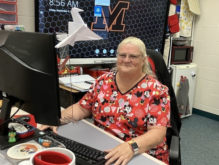 Annette “Netter” Neighbarger prepares for the day ahead in her room at Mount Vernon Middle School