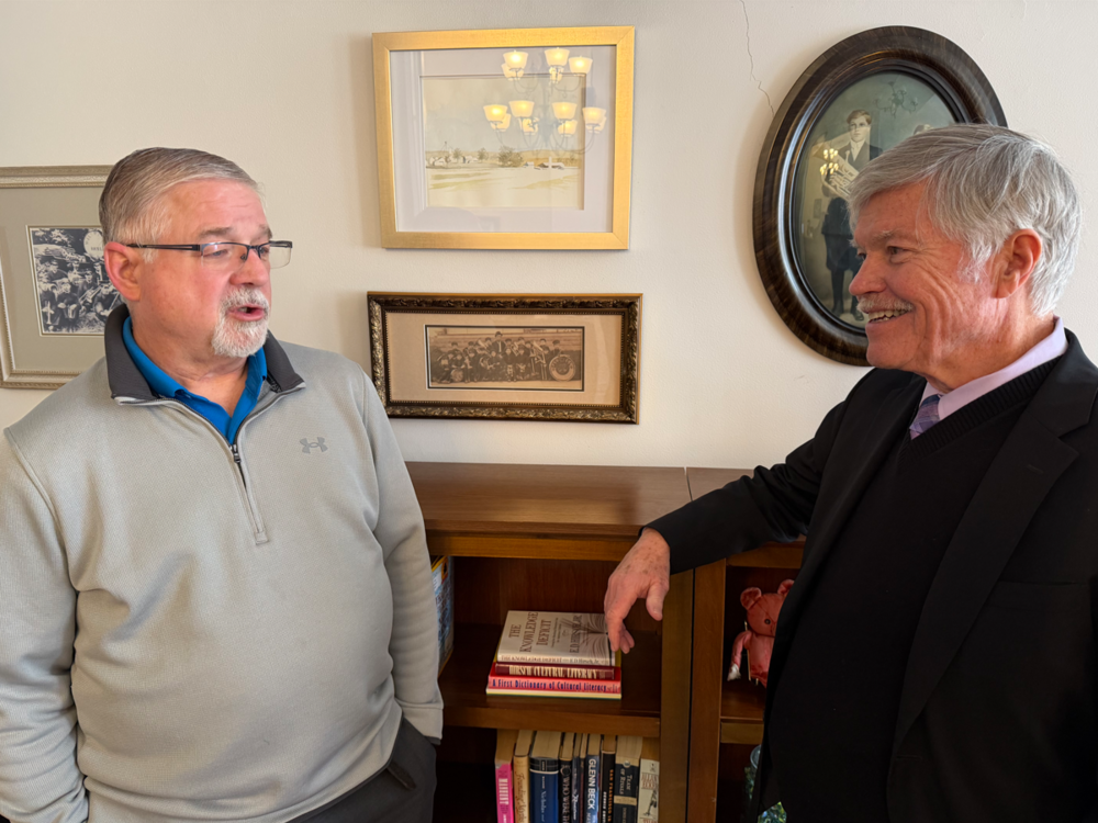 Mike Hebenthal, left, talks with Dr. Timm Mackley, superintendent of the Knox Educational Service Center. On Feb. 18 Hebenthal will begin teaching an artificial intelligence (AI) course at Ashland University
