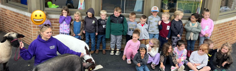 Preschool students interacted with a pig, goats and sheep outside their classrooms in the parking lot of the Centerburg Local Schools administration building.