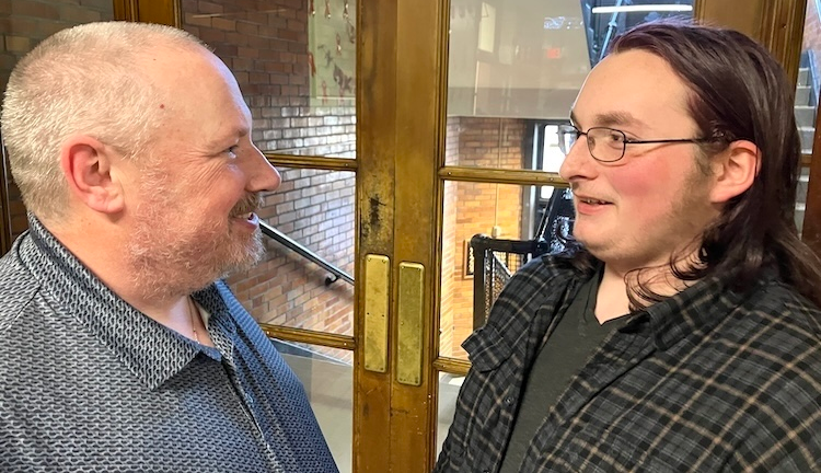 High school teacher Sean Sweeney bids farewell to Tristan Carter who earned his diploma at the Knox Learning Center.