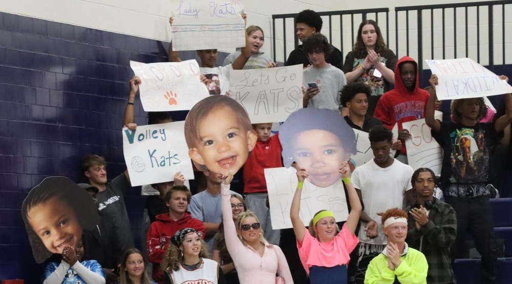 The KHS student section cheers for the volleyball team
