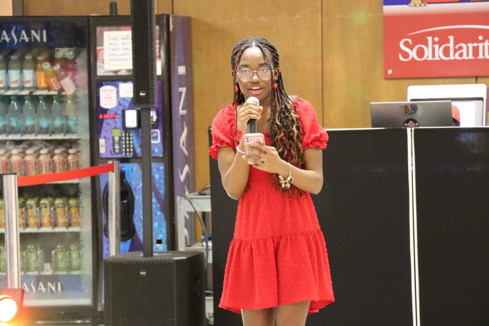 Senior Maddison Hodson recites her original poem.