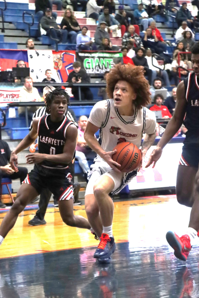 Korbyn Hammel drives to the basket during the Kat's win over Lafayette Jeff.