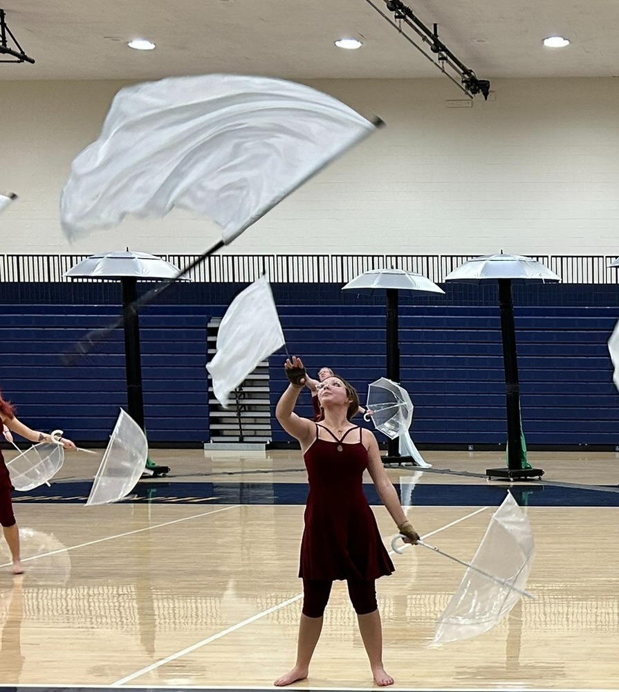 The KHS winter guard practices their show in the Haworth Gym.