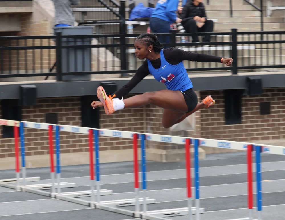 Junior Jhaz McKay competes in a hurdle event at last year's Kokomo Relays.