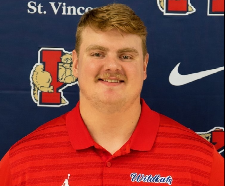 man in football coach shirt