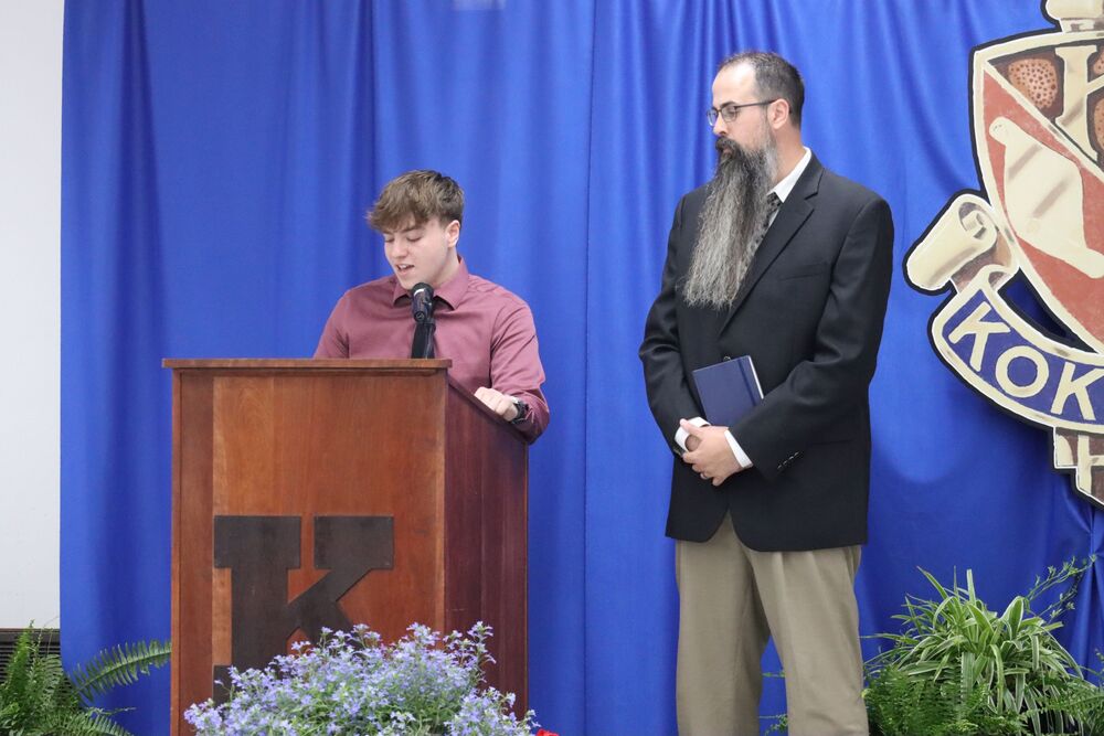 Ethan Kelser speaks at the Latin Honors dinner