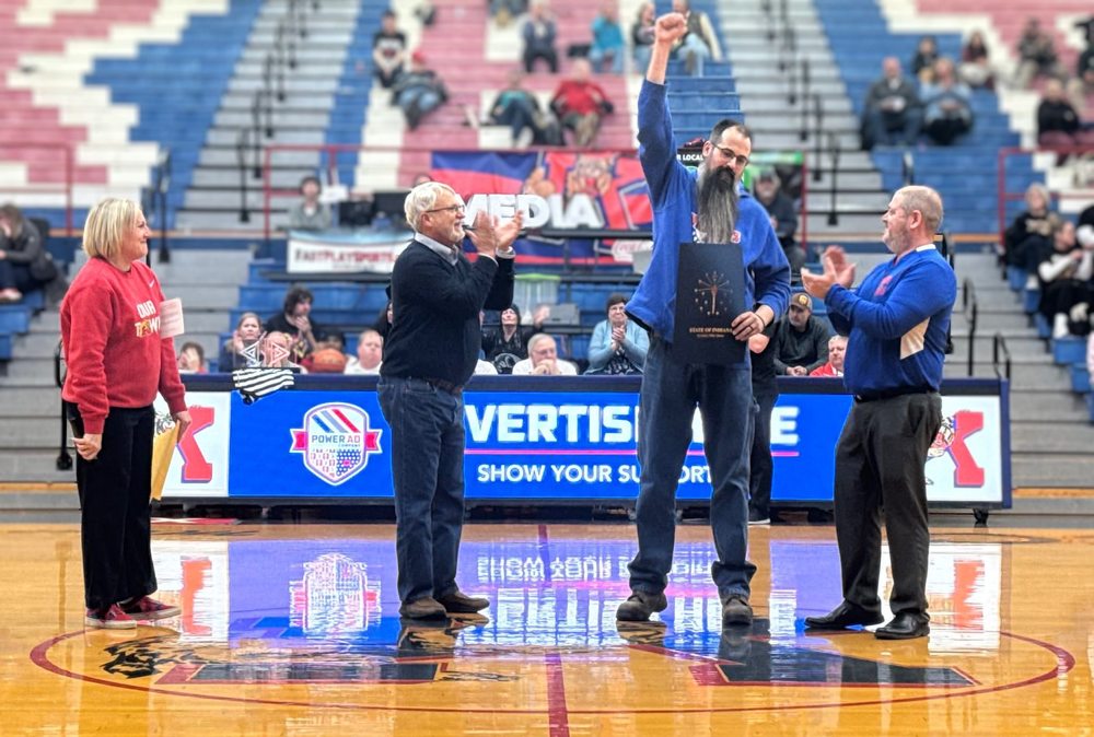Vince Lorenz is honored at a home basketball game.
