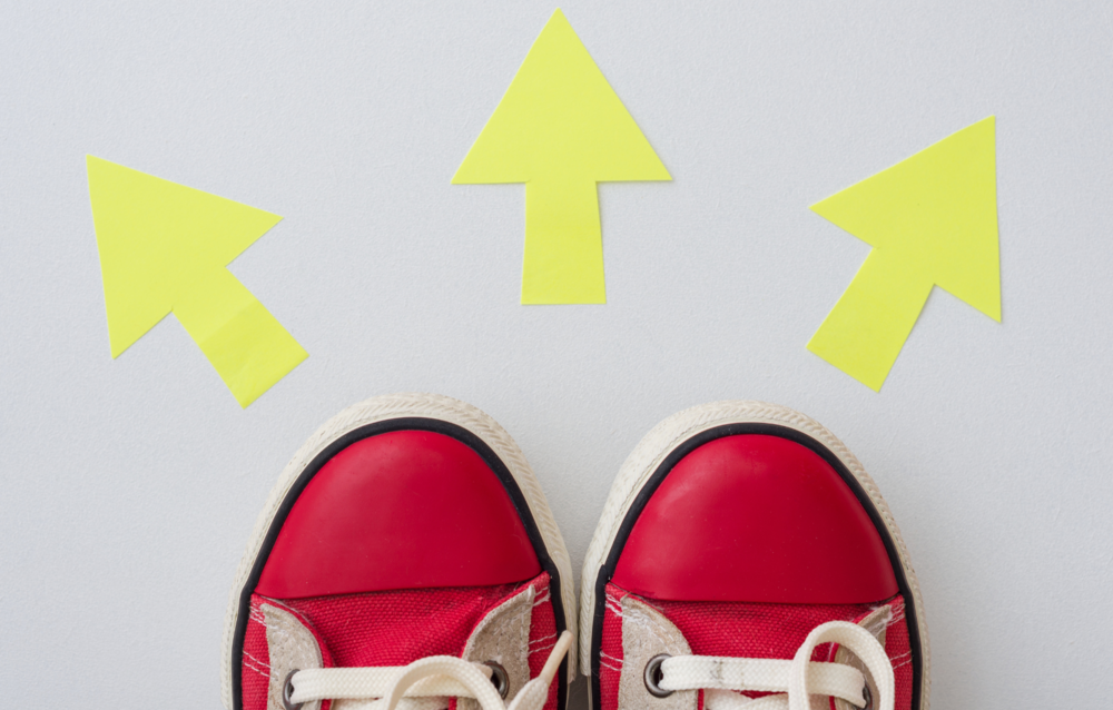 red shoes and yellow arrows pointing in different directions 