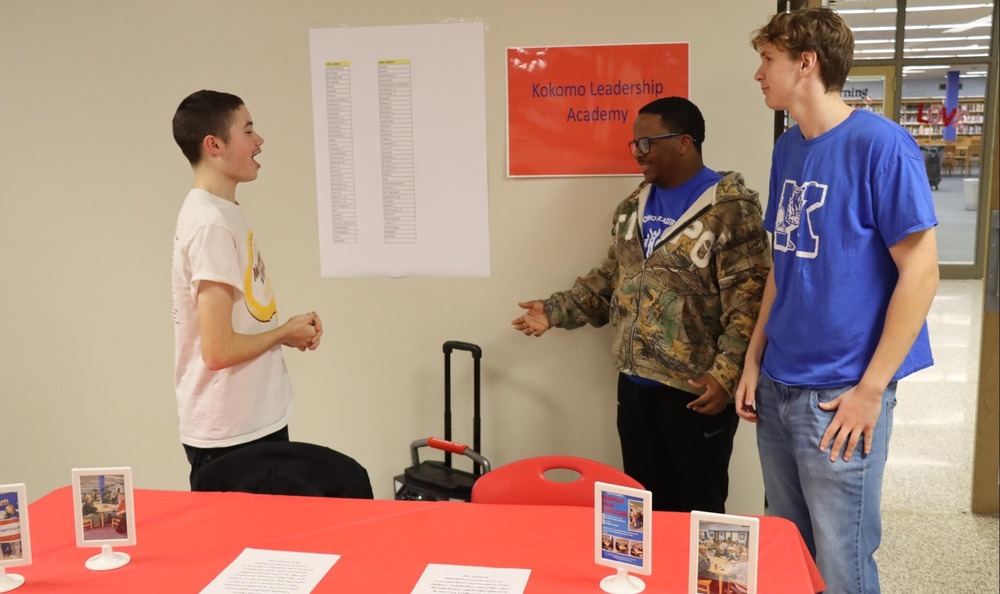 KLA members Hayden Cummins, Tayshawn Jones and Tyler Anderson set up their table at last year’s Wildkat Welcome Night
