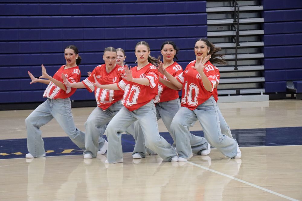 The Kokomo Dance Team performs their competition routine for parents before traveling to Orlando.